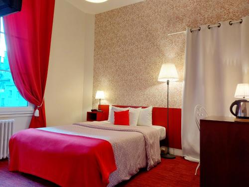 Кровать или кровати в номере Hotel Mondial