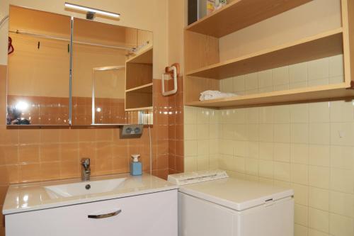 Et badeværelse på JANDRI 4 Appartement 6 personnes -38860 Les 2 Alpes - Pied des pistes