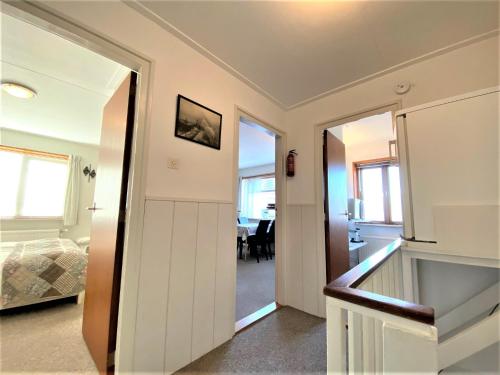 a hallway with a door leading into a room at Appartement Chridy AK08 in Aagtekerke