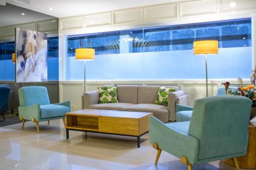 Χώρος καθιστικού στο Nevada Ketapang Hotel