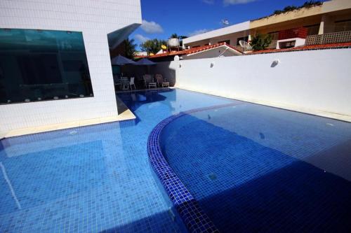 The swimming pool at or close to Flat no Hotel Carneiro de Tamandaré PRAIA DOS CARNEIROS