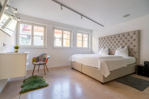 En eller flere senge i et værelse på Kaiser Max Design Appartements