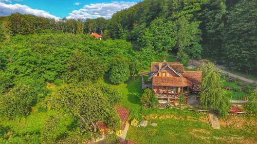 an aerial view of a house on a hill at Bungalovi Gučevski pogled - Banja Koviljača in Rupavci