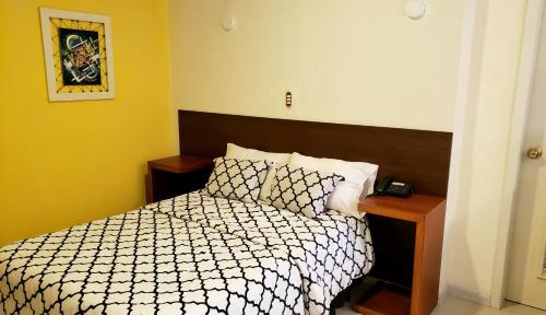 En eller flere senge i et værelse på ChezElena suites & apartments