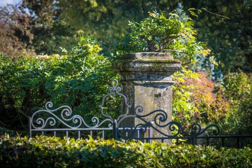 a bench with a plant on top of it at Villa Ines charme near Lucca in Altopascio