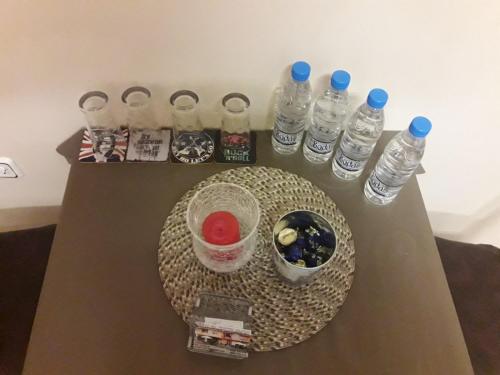 a group of bottles of water sitting on a table at Rooms Lagat in Troyan