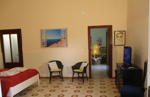 RESORT Giardino degli aranci - Casa Liscaにあるベッド