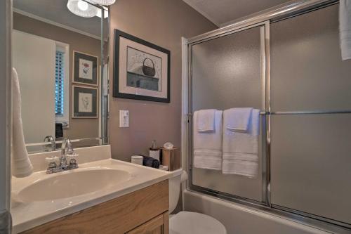 a bathroom with a sink and a shower at Serene Sky Valley Home with 180 Degree Mountain View in Sky Valley