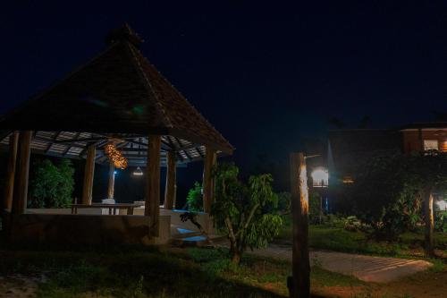 a gazebo at night with the sky at Cozycomo Chiang Dao - Wiang Mek in Chiang Dao