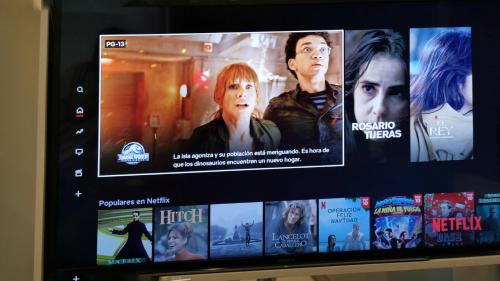 a television screen with several movies on it at Hotel Bonn in Mexico City