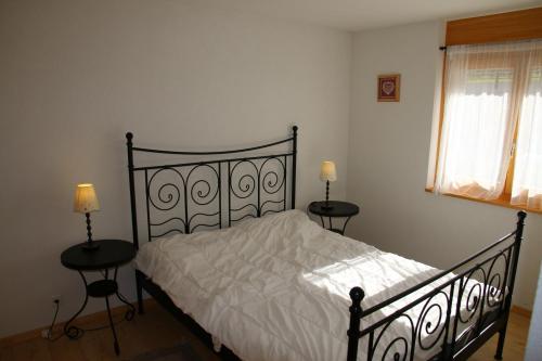 En eller flere senge i et værelse på Myosotis QUIET & SUNNY apartments by Alpvision Résidences by Alpvision Résidences