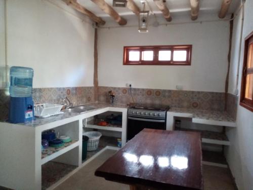 Küche/Küchenzeile in der Unterkunft Cabañas Ida Y Vuelta