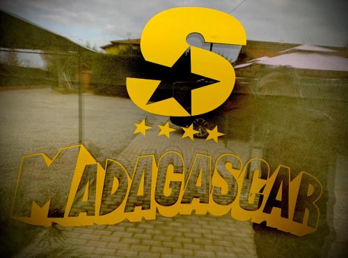 a sign that says maccaragency with stars at Hotel Motel Residence S in Front