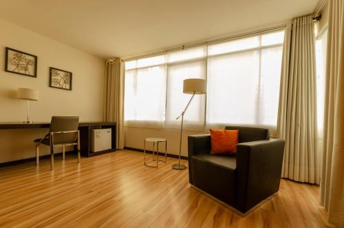 Χώρος καθιστικού στο Hotel NC La Paz