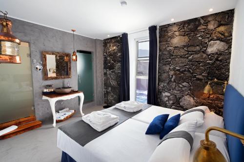 Postel nebo postele na pokoji v ubytování Hotel Puntagrande