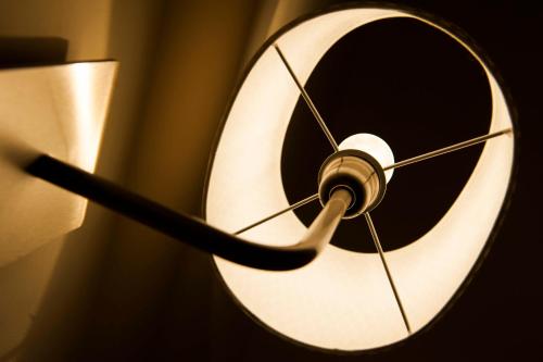 a close up of a ceiling fan with a light at SalernoPrestige rooms in Salerno