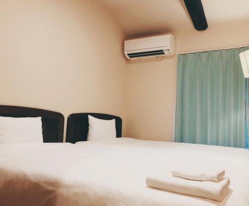 Tempat tidur dalam kamar di Ayamiya - Vacation STAY 03765v