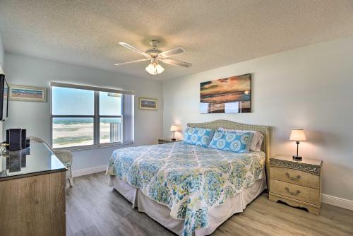 a bedroom with a bed and a window at Oceanfront Retreat with Pool Steps From Ormond Beach in Ormond Beach