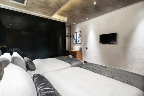 A&R Urban Hotelにあるテレビまたはエンターテインメントセンター