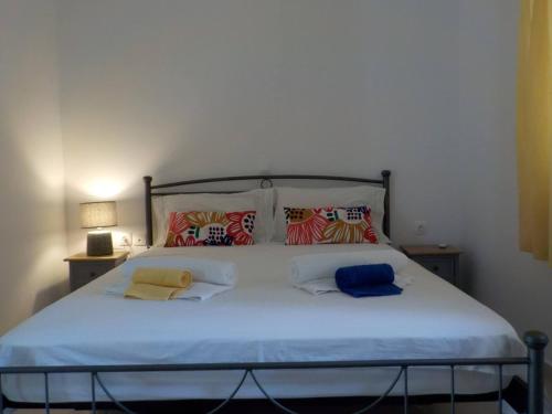 En eller flere senge i et værelse på Casa Aqua Marina