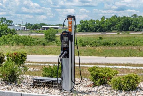 a gas pump on the side of a road at Comfort Suites Dry Ridge in Dry Ridge
