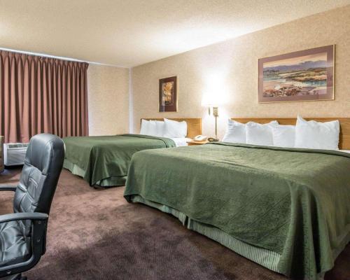 Ένα ή περισσότερα κρεβάτια σε δωμάτιο στο Quality Suites San Diego Otay Mesa
