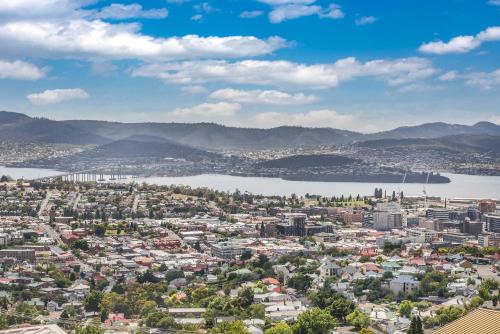 an aerial view of a city and a body of water at Hobart View in Hobart