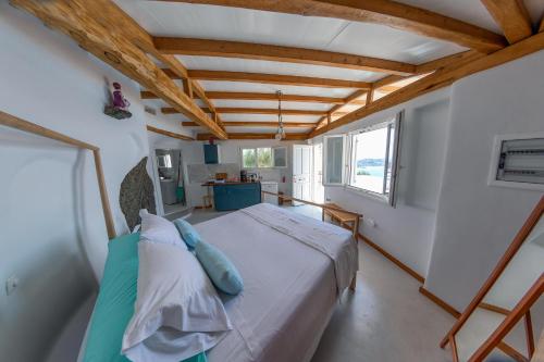 Posteľ alebo postele v izbe v ubytovaní Luxury Suites Poseidon
