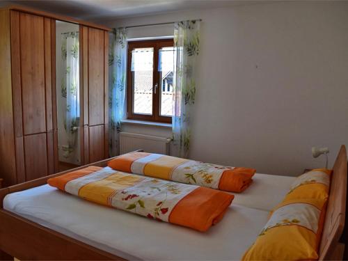 Ένα ή περισσότερα κρεβάτια σε δωμάτιο στο Ferienwohnung Irmgard