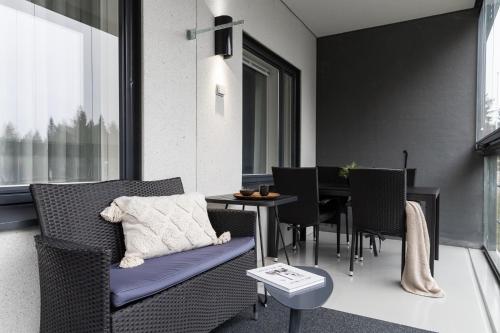 Ruang duduk di Aateli Lakeside Chalets - former Vuokatti Suites