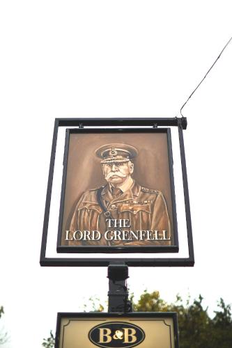 a sign for the lord grimmfield on a pole at The Lord Grenfell in Maidenhead
