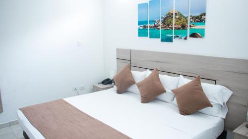 Ένα ή περισσότερα κρεβάτια σε δωμάτιο στο BLH Business Loft Hotel
