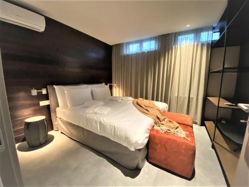 Кровать или кровати в номере Korpa Deli Rooms SPA