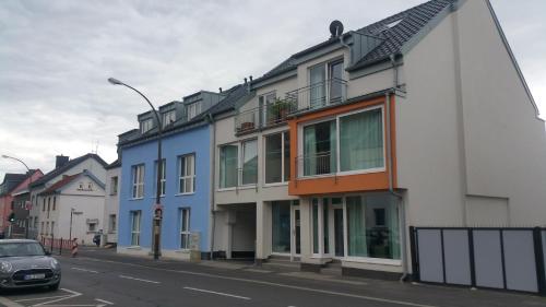 a row of houses on a city street at K314 in Bonn