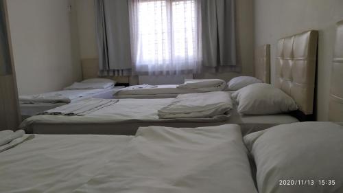 Ένα ή περισσότερα κρεβάτια σε δωμάτιο στο Marpalace Hotel