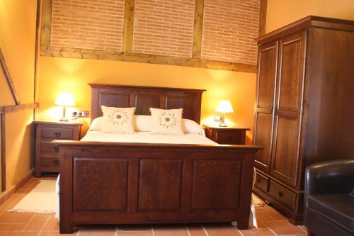 Ένα ή περισσότερα κρεβάτια σε δωμάτιο στο Hotel Rural Cerro Principe