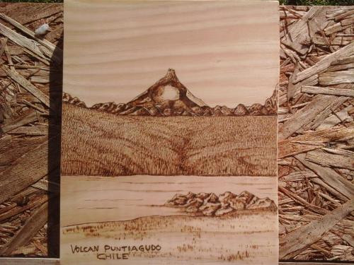 a painting of a mountain with rocks in the foreground at Topahue in Ensenada