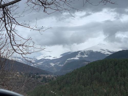 a view of a mountain range with snow capped mountains at Casa Rural Pirineu Nevà in Nevà