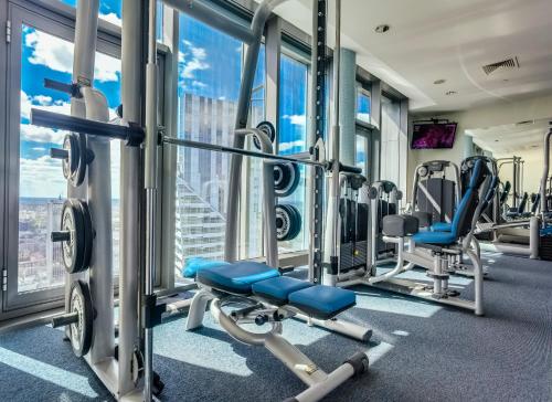 a gym with a view of the city at InterContinental Warszawa by IHG in Warsaw