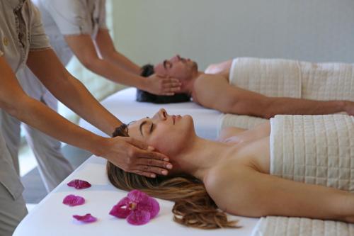 a woman getting a massage at a spa at InterContinental Real Santo Domingo by IHG in Santo Domingo