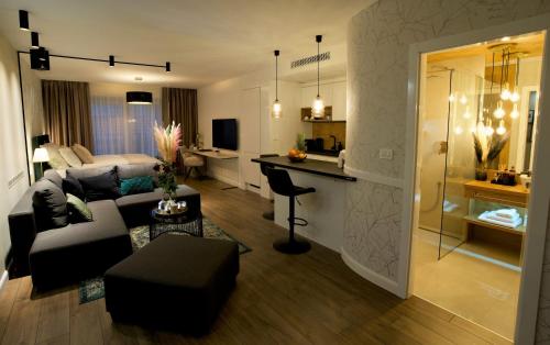Televízia a/alebo spoločenská miestnosť v ubytovaní Apartman My Story