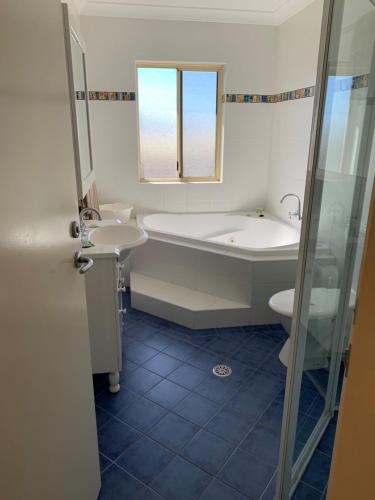 Ванная комната в Bel Mondo Apartments