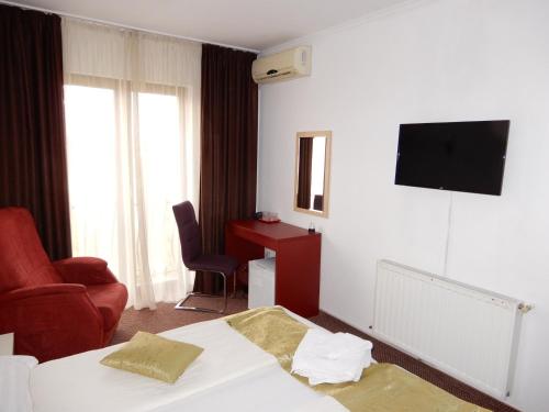 Μια τηλεόραση ή/και κέντρο ψυχαγωγίας στο RHC Royal Hotel