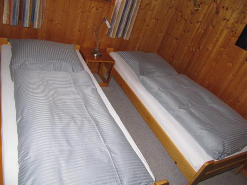 מיטה או מיטות בחדר ב-Eschenkamp 9c