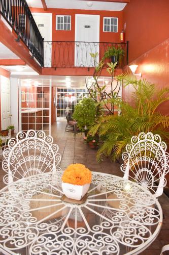 a table with a bowl of food on top of it at Hotel Camba in Oaxaca City