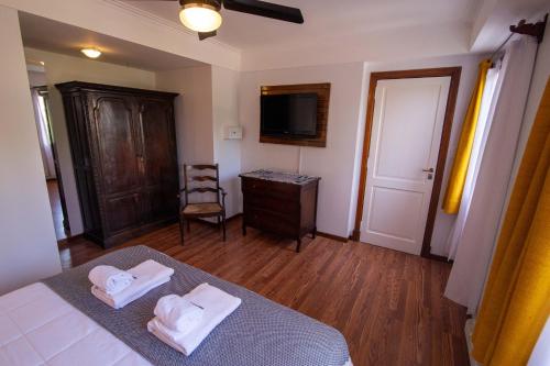 Postel nebo postele na pokoji v ubytování Casa Camaron