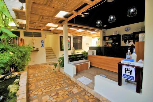 a kitchen with a table and chairs in it at Casa Janaab Palenque in Palenque
