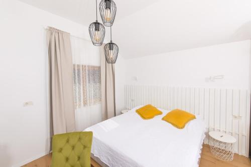 En eller flere senger på et rom på Design Villa Mar Hvar Island