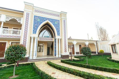 Κήπος έξω από το Mirzo Boutique Hotel