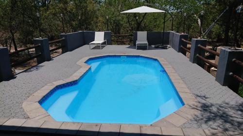 Πισίνα στο ή κοντά στο SVH Bush Lodge